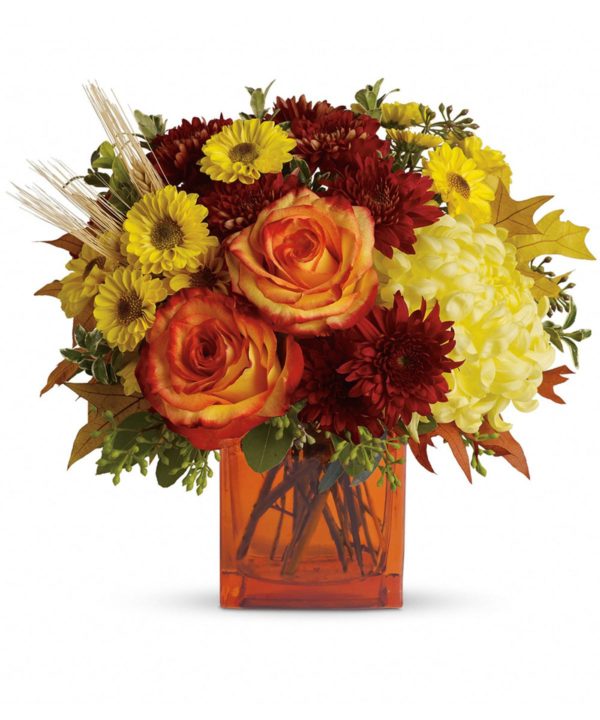 Orange roses, yellow daisies and red mums in a vase