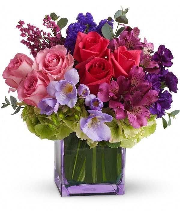 red and pink roses with purple stock and pink alstroemeria