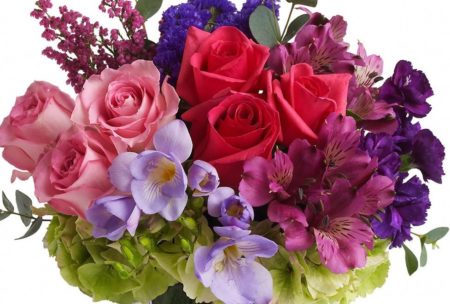 brilliant blossoms are gorgeously arranged and delivered in an exclusive lavender vase.